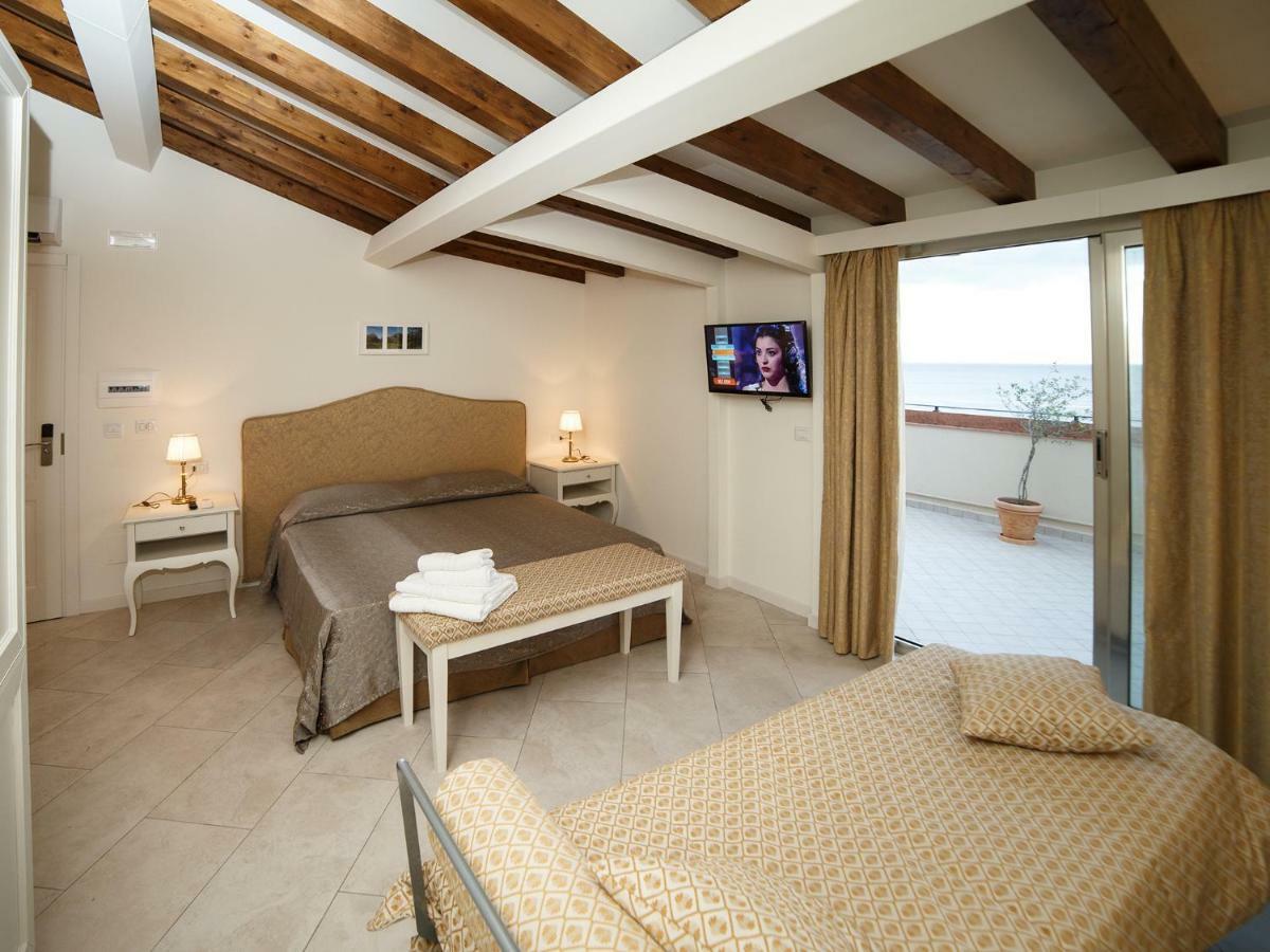 Апартаменты Marina Di Savoca Санта-Тереза-ди-Рива Экстерьер фото
